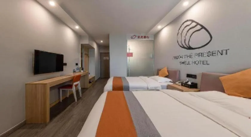Bed in Shell Hotel Suzhou Zhangjiagang Jingang Town Central Plaza