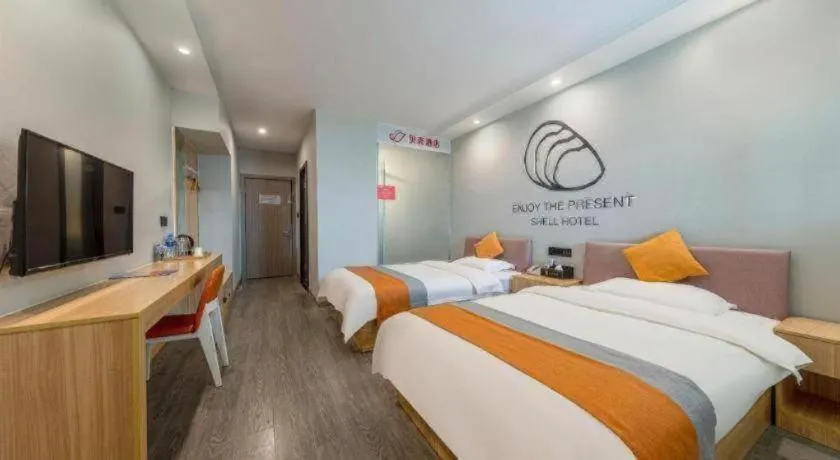 Bed in Shell Hotel Suzhou Zhangjiagang Jingang Town Central Plaza