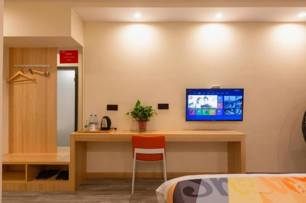 Bed in Shell Hotel Suzhou Zhangjiagang Jingang Town Central Plaza