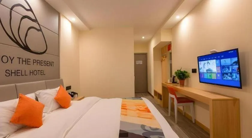 Bed in Shell Hotel Suzhou Zhangjiagang Jingang Town Central Plaza