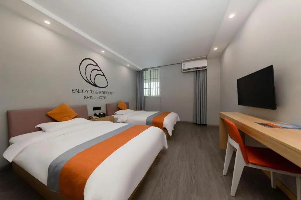 Bed in Shell Hotel Suzhou Zhangjiagang Jingang Town Central Plaza