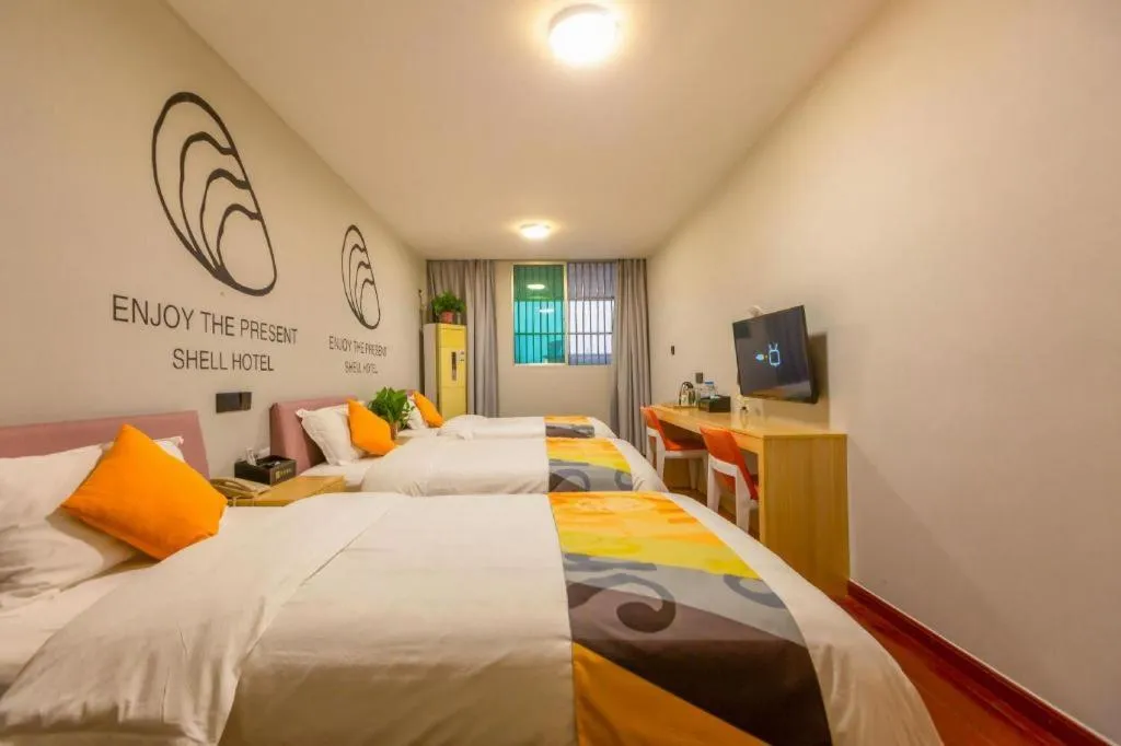 Bed in Shell Hotel Suzhou Zhangjiagang Jingang Town Central Plaza