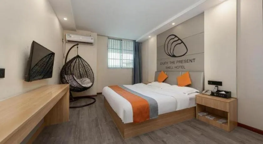 Bed in Shell Hotel Suzhou Zhangjiagang Jingang Town Central Plaza