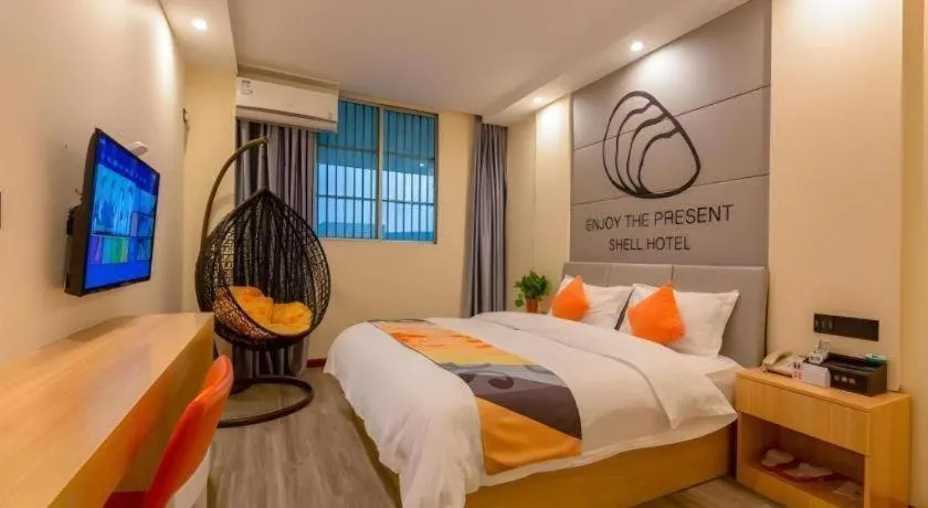 Bed in Shell Hotel Suzhou Zhangjiagang Jingang Town Central Plaza