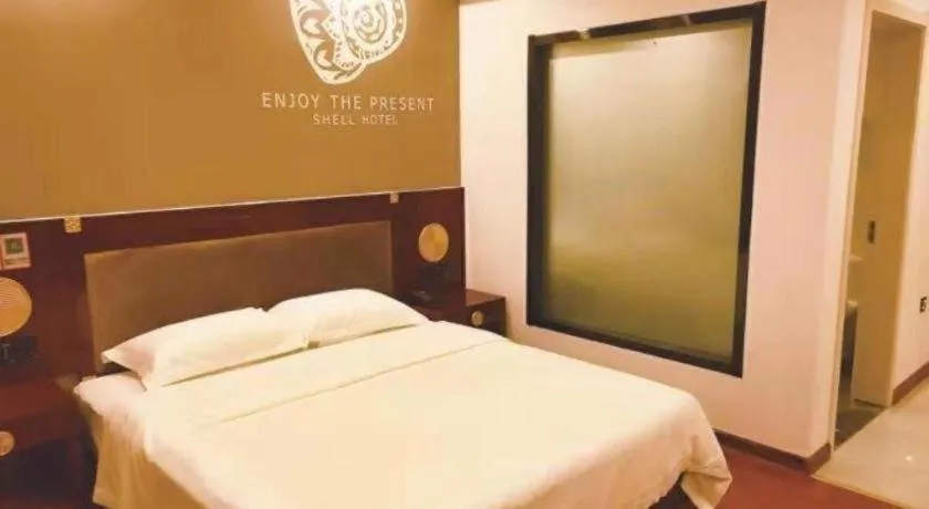 Bed in Shell Hotel Liaocheng Dongchang Xi Road Railway Station