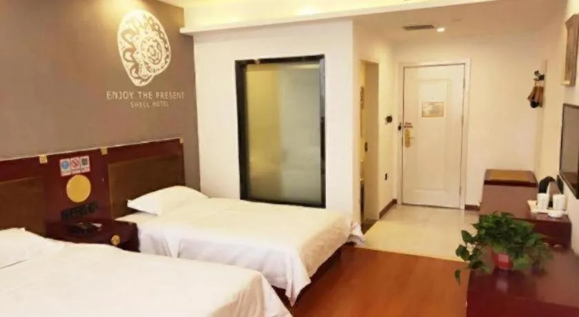 Bed in Shell Hotel Liaocheng Dongchang Xi Road Railway Station