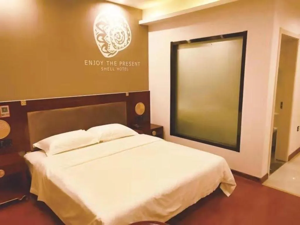 Bed in Shell Hotel Liaocheng Dongchang Xi Road Railway Station