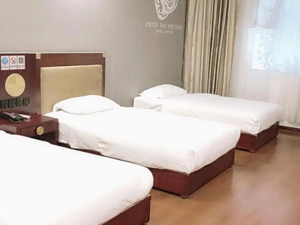 Bed in Shell Hotel Liaocheng Dongchang Xi Road Railway Station