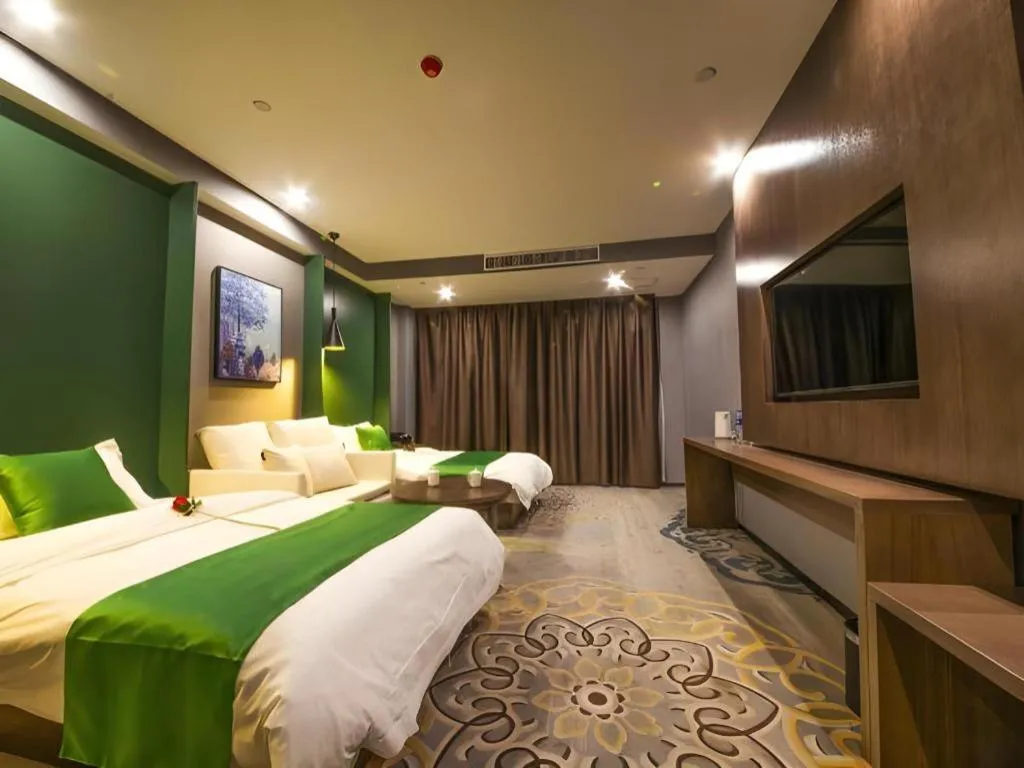 Bed in Shell Hotel Zhengzhou East High-Speed Railway Station Zhengdong Commerical Center