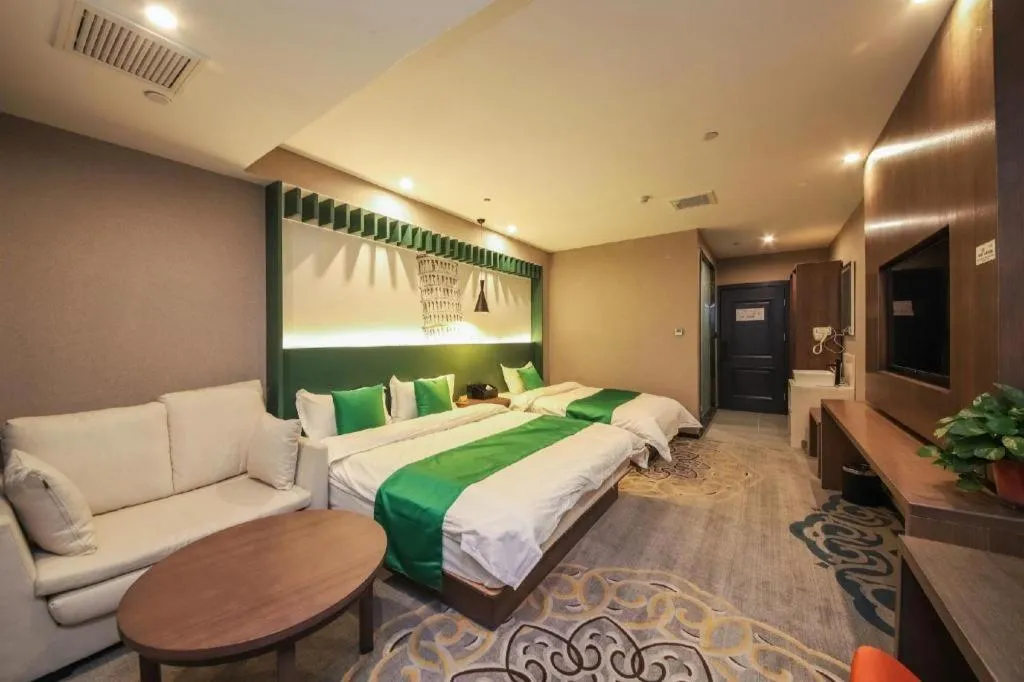 Bed in Shell Hotel Zhengzhou East High-Speed Railway Station Zhengdong Commerical Center