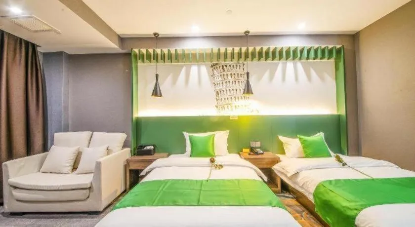 Bed in Shell Hotel Zhengzhou East High-Speed Railway Station Zhengdong Commerical Center