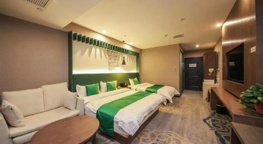 Bed in Shell Hotel Zhengzhou East High-Speed Railway Station Zhengdong Commerical Center