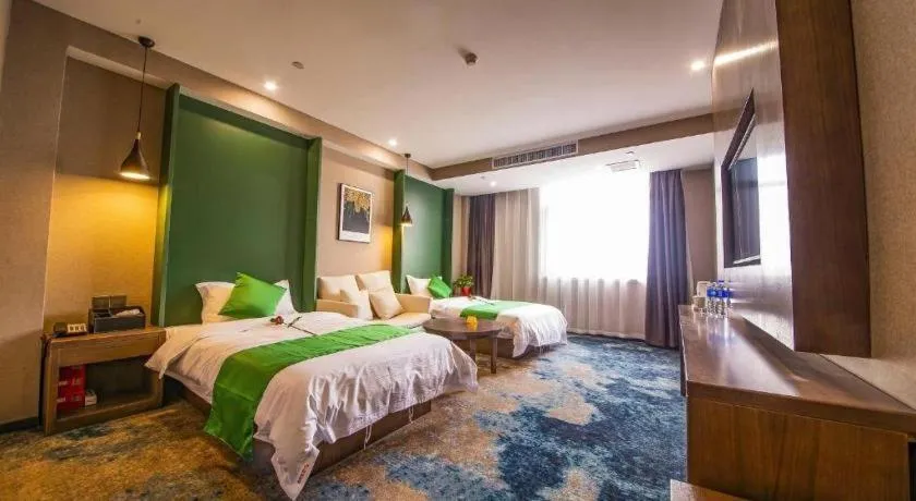 Bed in Shell Hotel Zhengzhou East High-Speed Railway Station Zhengdong Commerical Center