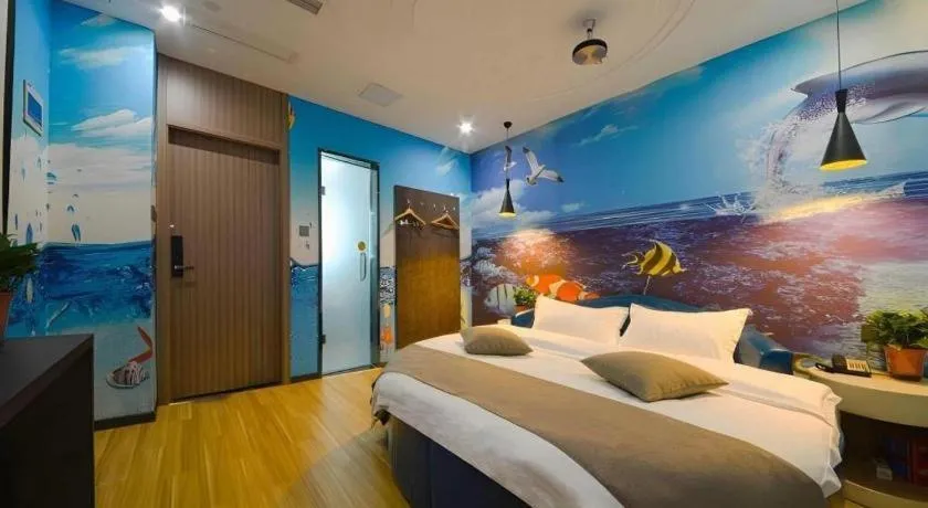 Bed in Shell Hotel Zhengzhou East High-Speed Railway Station Zhengdong Commerical Center