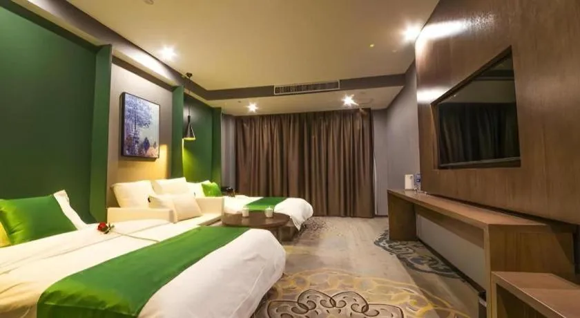 Bed in Shell Hotel Zhengzhou East High-Speed Railway Station Zhengdong Commerical Center