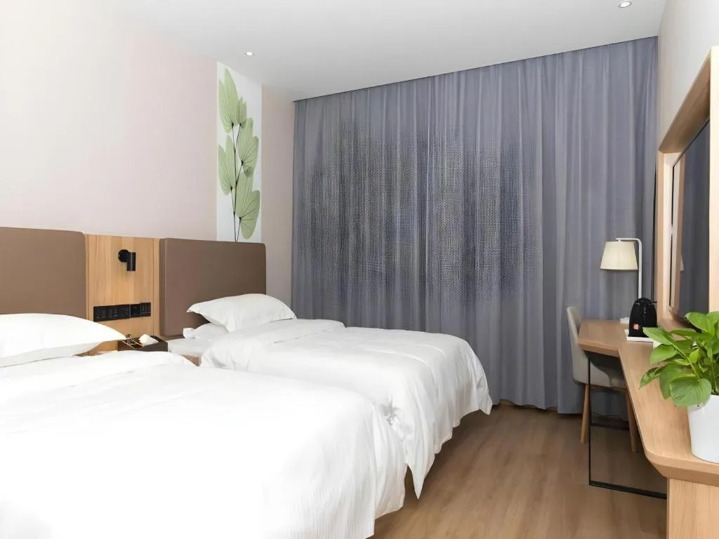 Bed in GreenTree Inn Hubei Yangxin County Lianhua Lake Mingyue Bay