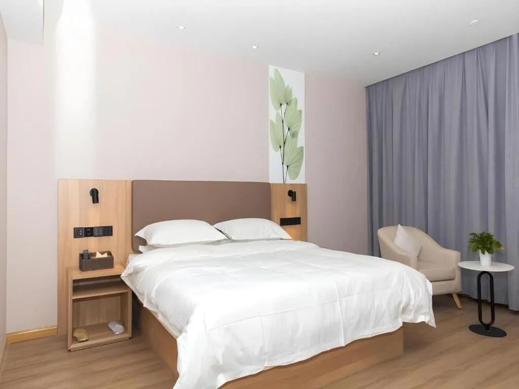 Bed in GreenTree Inn Hubei Yangxin County Lianhua Lake Mingyue Bay