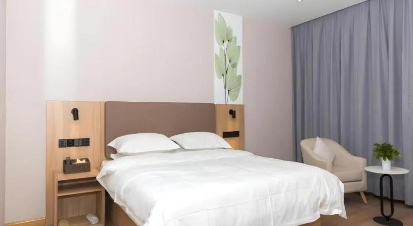 Bed in GreenTree Inn Hubei Yangxin County Lianhua Lake Mingyue Bay