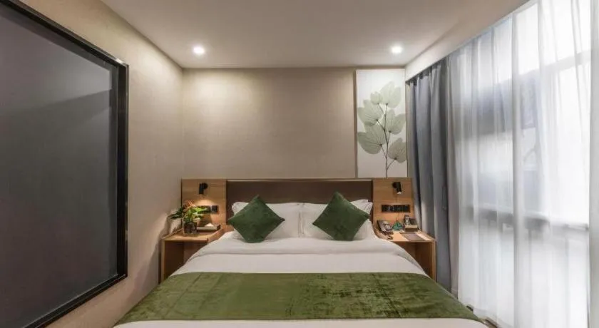 Bed in GreenTree Inn Express Zhangjiagang Hexing Town Shazhou Professional Institue of Technology