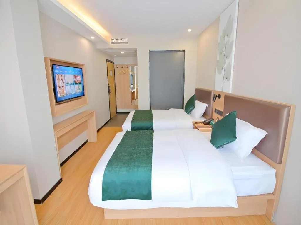 Bed in GreenTree Inn Express Zhangjiagang Hexing Town Shazhou Professional Institue of Technology