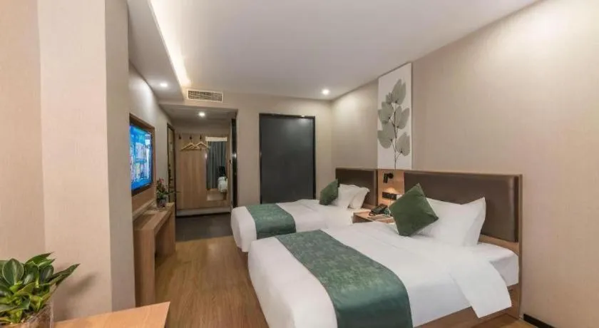 Bed in GreenTree Inn Express Zhangjiagang Hexing Town Shazhou Professional Institue of Technology