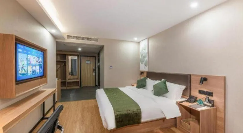 Bed in GreenTree Inn Express Zhangjiagang Hexing Town Shazhou Professional Institue of Technology