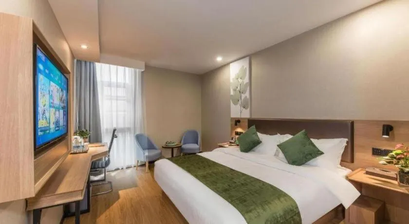 Bed in GreenTree Inn Express Zhangjiagang Hexing Town Shazhou Professional Institue of Technology