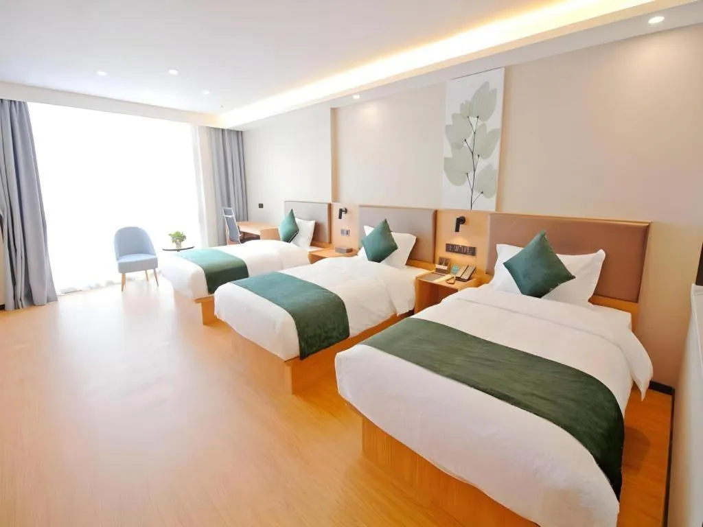 Bed in GreenTree Inn Express Zhangjiagang Hexing Town Shazhou Professional Institue of Technology