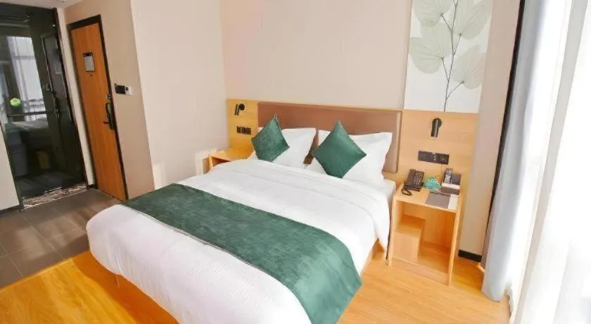 Bed in GreenTree Inn Express Zhangjiagang Hexing Town Shazhou Professional Institue of Technology
