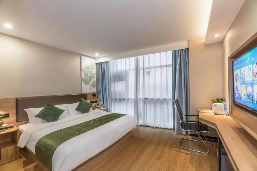 Bed in GreenTree Inn Express Zhangjiagang Hexing Town Shazhou Professional Institue of Technology