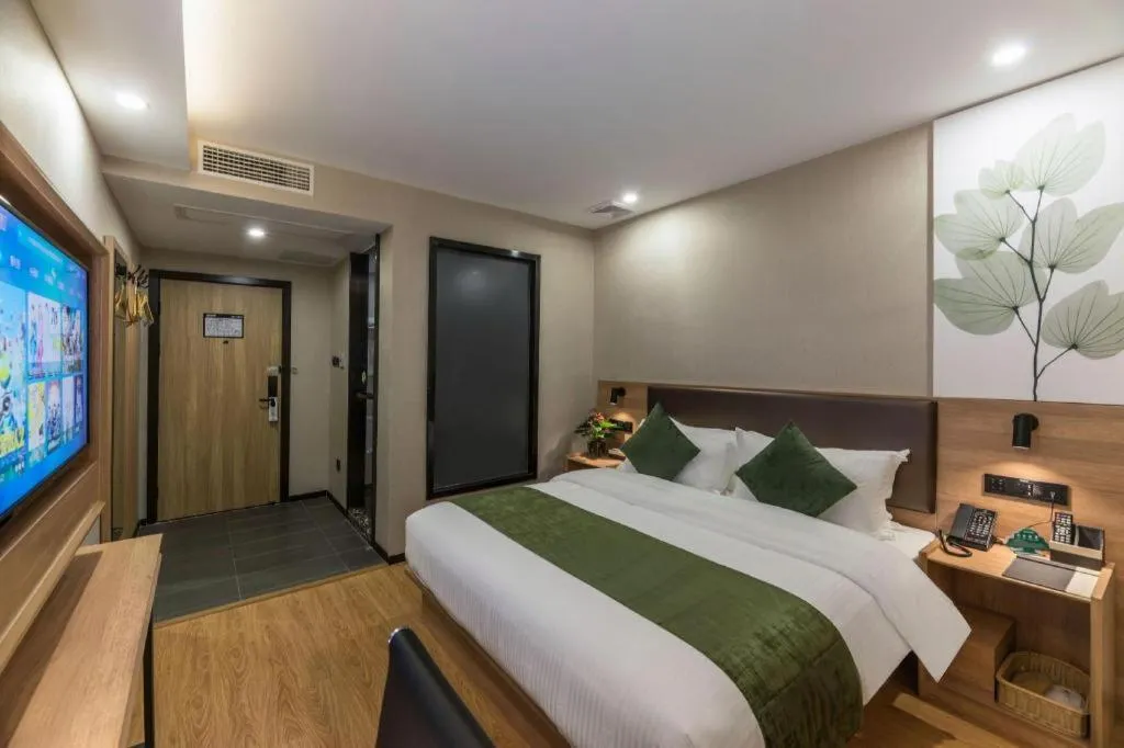 Bed in GreenTree Inn Express Zhangjiagang Hexing Town Shazhou Professional Institue of Technology