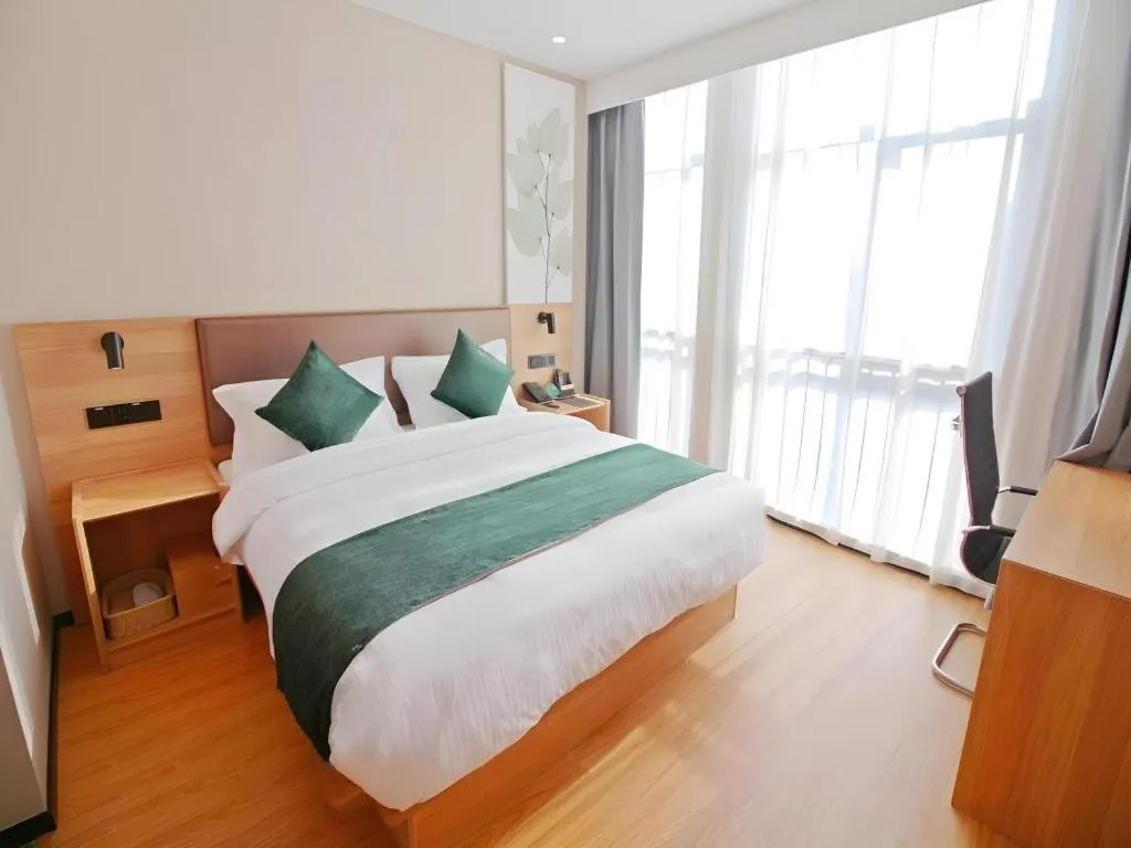 Bed in GreenTree Inn Express Zhangjiagang Hexing Town Shazhou Professional Institue of Technology