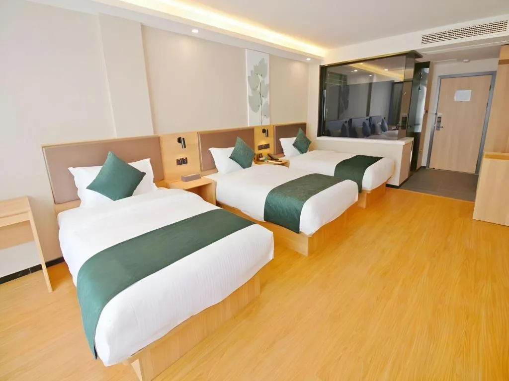 Bed in GreenTree Inn Express Zhangjiagang Hexing Town Shazhou Professional Institue of Technology