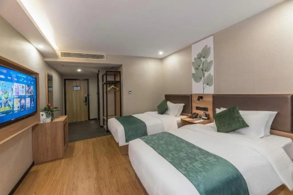 Bed in GreenTree Inn Express Zhangjiagang Hexing Town Shazhou Professional Institue of Technology