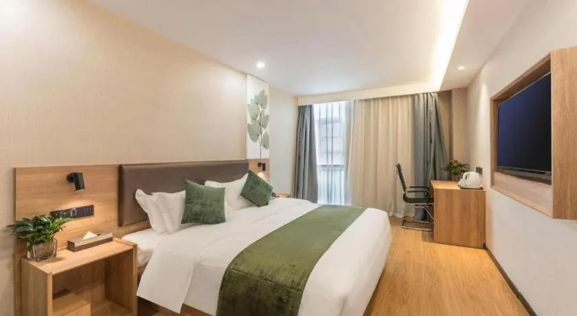 Bed in GreenTree Inn Express Zhangjiagang Hexing Town Shazhou Professional Institue of Technology