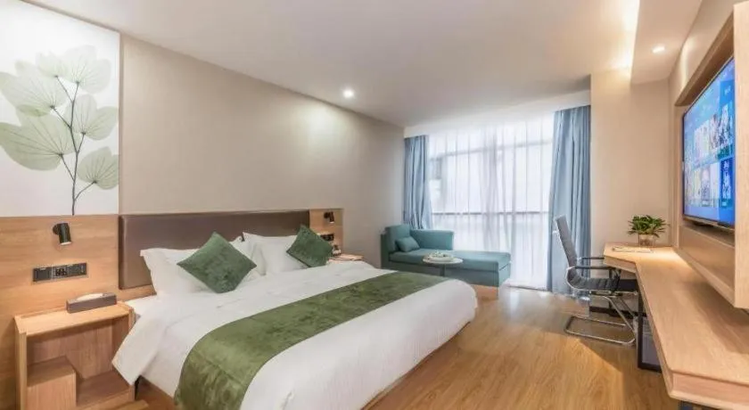 Bed in GreenTree Inn Express Zhangjiagang Hexing Town Shazhou Professional Institue of Technology
