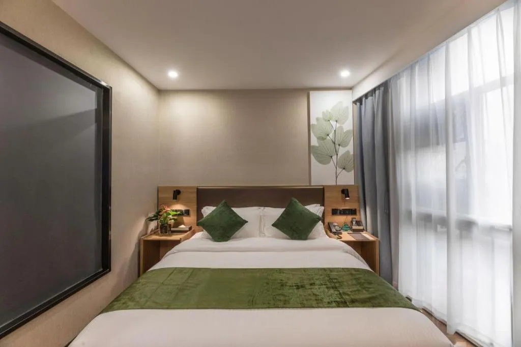 Bed in GreenTree Inn Express Zhangjiagang Hexing Town Shazhou Professional Institue of Technology