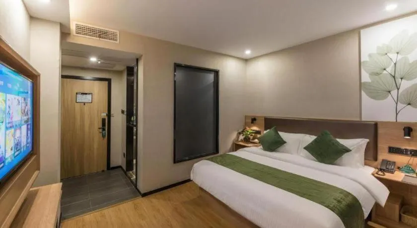 Bed in GreenTree Inn Express Zhangjiagang Hexing Town Shazhou Professional Institue of Technology