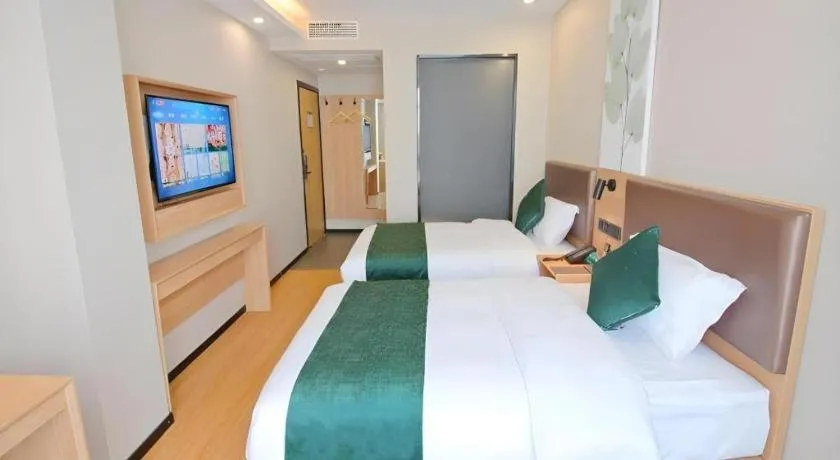 Bed in GreenTree Inn Express Zhangjiagang Hexing Town Shazhou Professional Institue of Technology