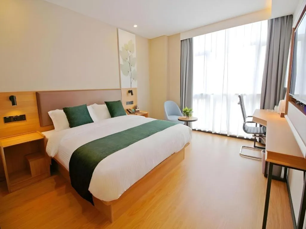 Bed in GreenTree Inn Express Zhangjiagang Hexing Town Shazhou Professional Institue of Technology