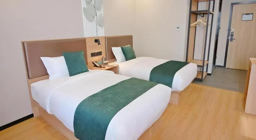 Bed in GreenTree Inn Express Zhangjiagang Hexing Town Shazhou Professional Institue of Technology
