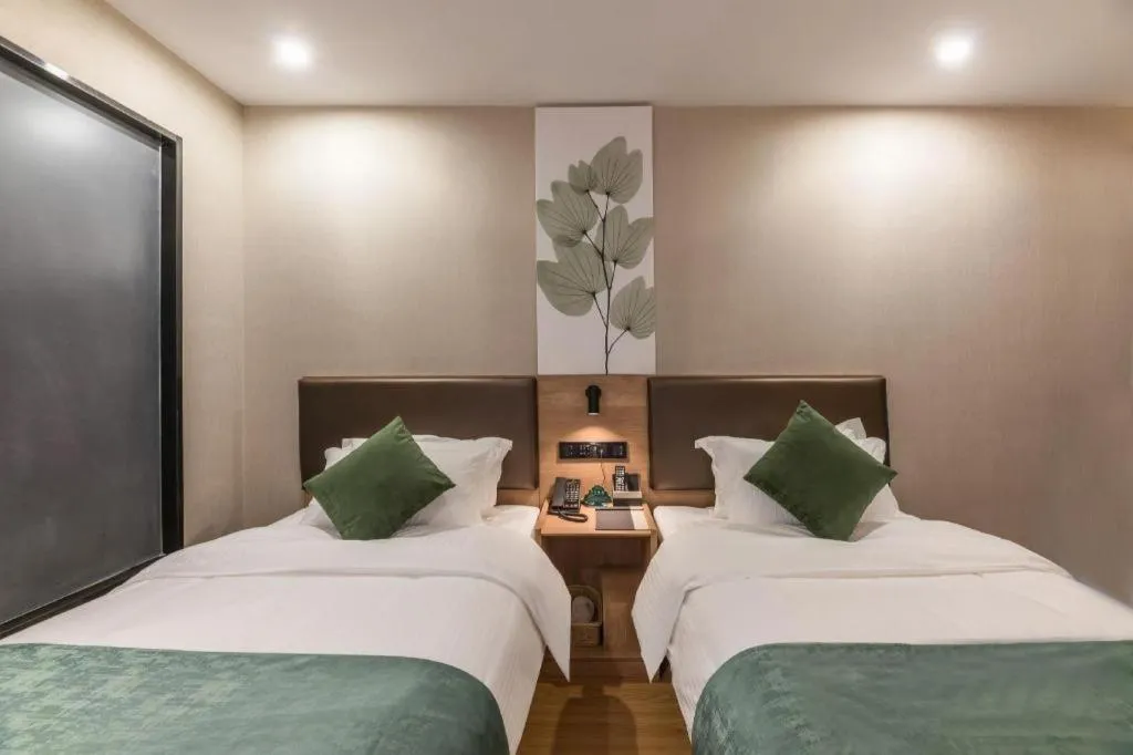 Bed in GreenTree Inn Express Zhangjiagang Hexing Town Shazhou Professional Institue of Technology