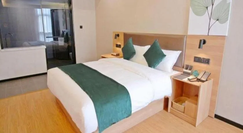 Bed in GreenTree Inn Express Zhangjiagang Hexing Town Shazhou Professional Institue of Technology