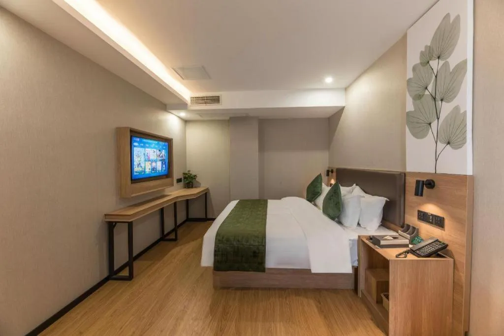 Bed in GreenTree Inn Express Zhangjiagang Hexing Town Shazhou Professional Institue of Technology