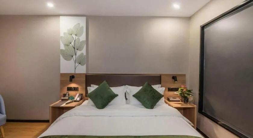 Bed in GreenTree Inn Express Zhangjiagang Hexing Town Shazhou Professional Institue of Technology