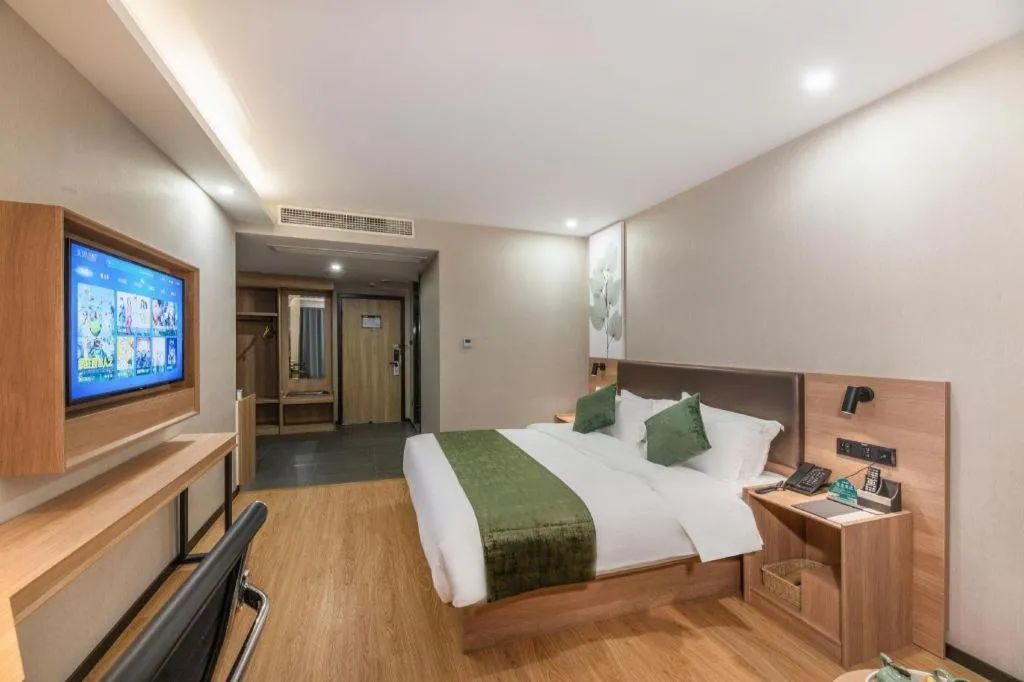 Bed in GreenTree Inn Express Zhangjiagang Hexing Town Shazhou Professional Institue of Technology