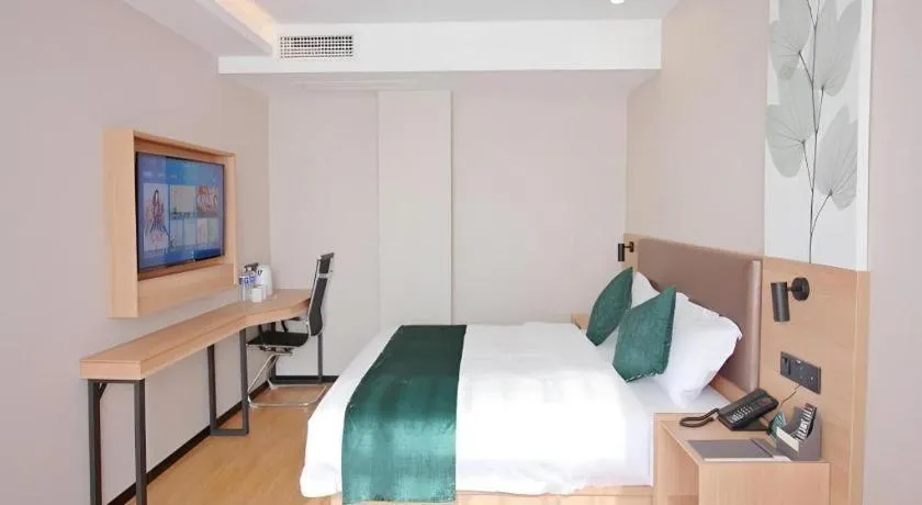 Bed in GreenTree Inn Express Zhangjiagang Hexing Town Shazhou Professional Institue of Technology