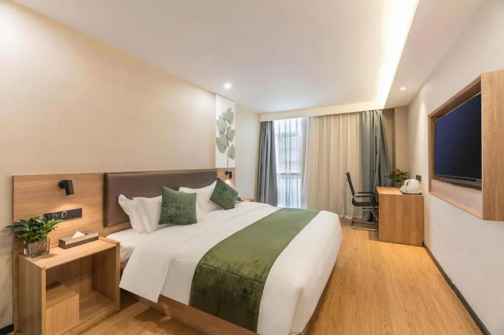 Bed in GreenTree Inn Express Zhangjiagang Hexing Town Shazhou Professional Institue of Technology