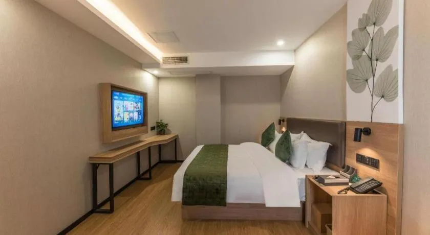 Bed in GreenTree Inn Express Zhangjiagang Hexing Town Shazhou Professional Institue of Technology