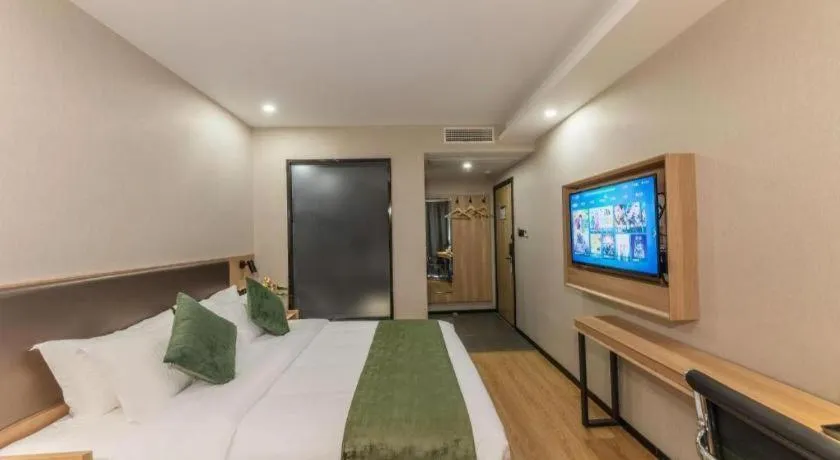 Bed in GreenTree Inn Express Zhangjiagang Hexing Town Shazhou Professional Institue of Technology